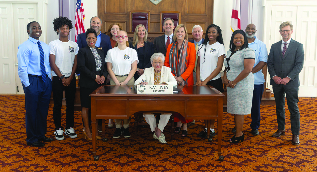 Alabama Governor Kay Ivey with a group of people from GEAR UP.